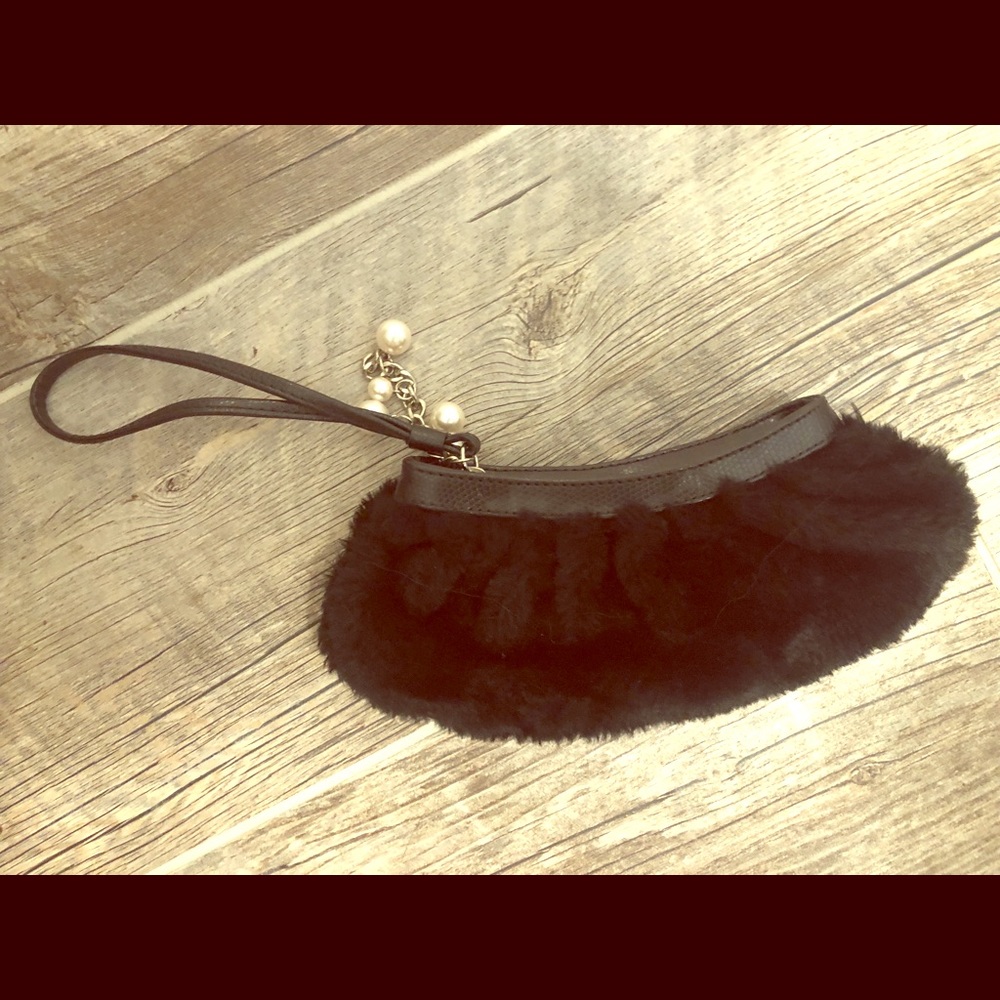 Furry black wristlet with pearl decoration